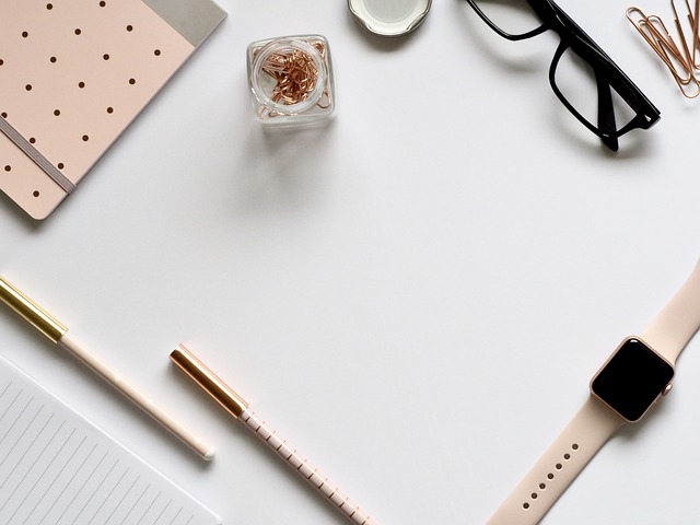 Image of schedule planner and a ruler on a desk